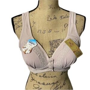 Beautiful lavender lace bra with snap front buttons. NWT.